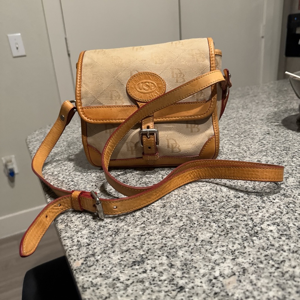 Vintage circa 2010ish Dooney and Bourke crossbody saddle bag